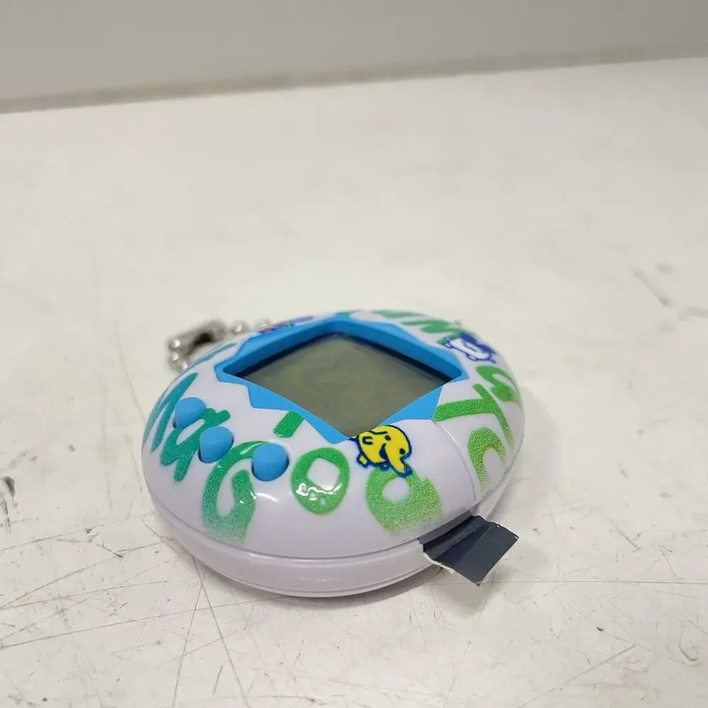 2017 Tamagotchi 20th Anniversary Celebration Edition Repeating Logo Tested Works